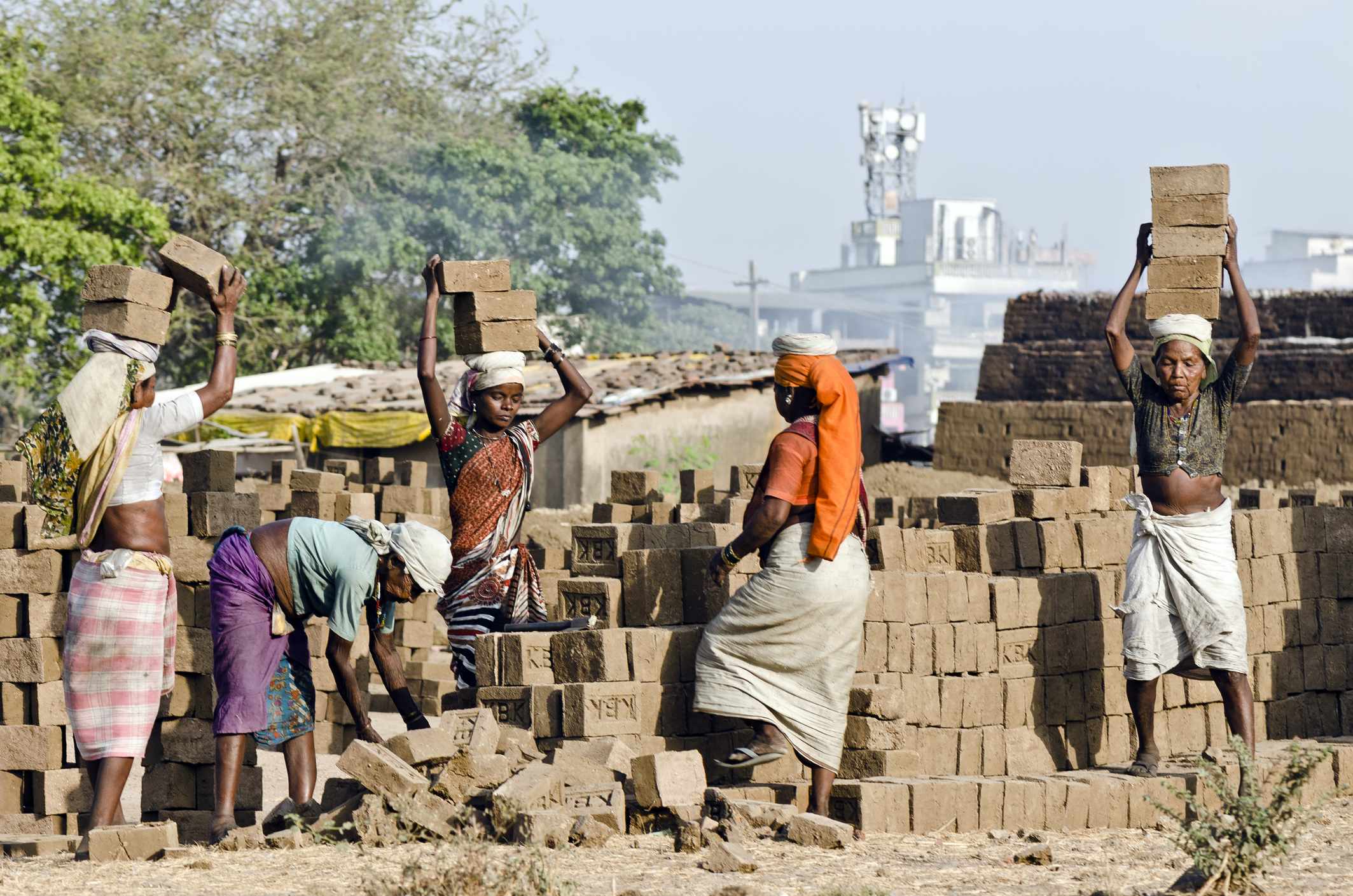 Brick Kiln Workers, Mumbai Women working at a brick kiln near Mumbai.